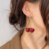 Double cherry drop earrings like the Jacqemus Cherry Earrings