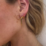 UGC video of Bixby Bow shaped snake chain earrings 